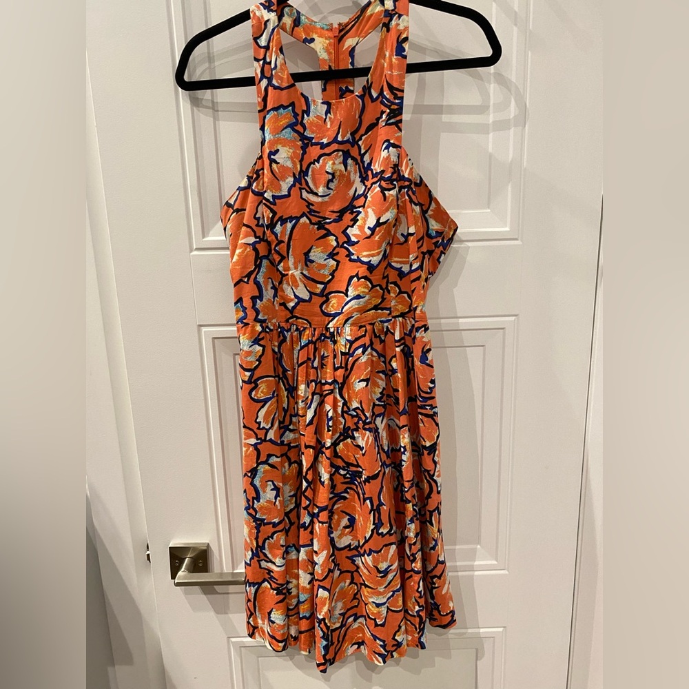 A line sundress with geometric neckline, racerback and pockets